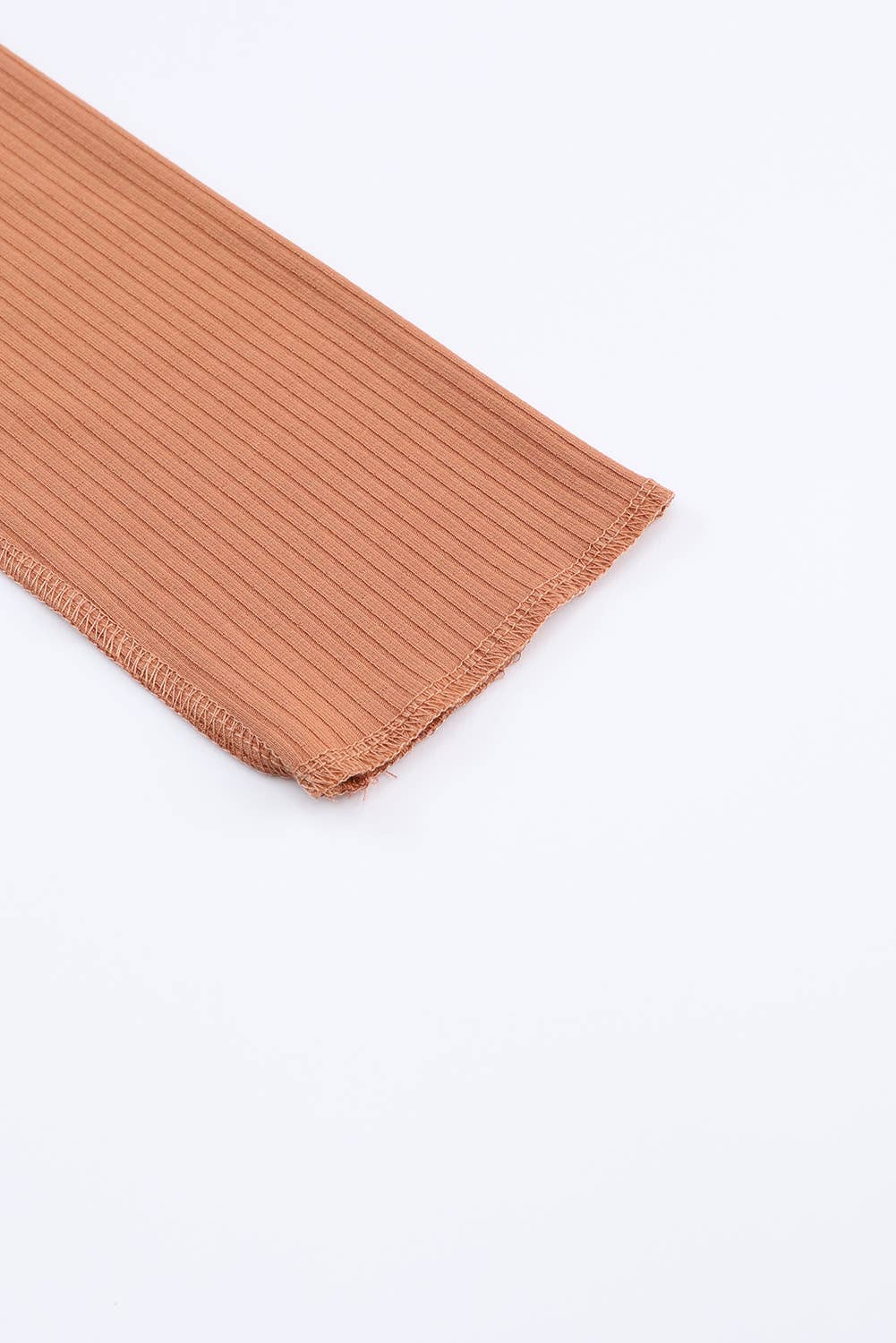 Exposed Seam Ribbed Knit Top